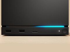 Vista frontale della Valve Steam Machine con doppie porte USB, una porta USB-C, un LED di alimentazione, un pulsante di accensione rotondo e una striscia LED blu. (Fonte: Valve)