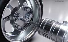 L'albero di trasmissione di Uni Wheel si collega a un ingranaggio di trasmissione che aziona gli ingranaggi pinioin, a loro volta collegati a un ingranaggio ad anello esterno per azionare la ruota. (Fonte: Hyundai Motor Group)