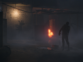 Nella foto - un fermo immagine dal trailer ufficiale di Operation: Outbreak, che mostra uno zombie accanto ad un fuoco su uno sfondo scuro. (Fonte: Steam)