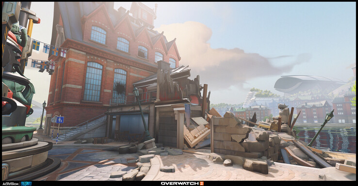 Le strade piene di macerie e gli interni parzialmente distrutti di Overwatch 2 evidenziano la narrazione ambientale dietro gli spazi delle missioni storia del gioco, segnati dal conflitto.