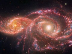 Un'immagine scattata dal Telescopio Spaziale James Webb, che mostra le due galassie IC 2163 e NGC 2207 che si fondono. (Fonte dell'immagine: © NASA, ESA, CSA, STScI)