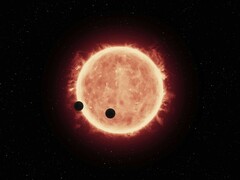 Un'illustrazione che mostra una stella e due pianeti.