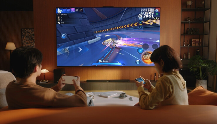 Il Huawei Mate TV Pro in streaming wireless da uno smartphone e controllato dal suo insolito telecomando trackpad. (Fonte: Huawei)