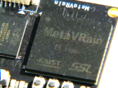 Il chip MetaVRain è più piccolo di una normale moneta. (Fonte immagine: YouTube) 