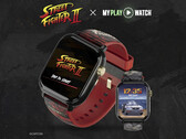 Orologio da gaming Street Fighter II: My Play Watch con cinturino rosso, dettagli con finitura dorata e un secondo display dell'orologio, su uno sfondo scuro testurizzato.