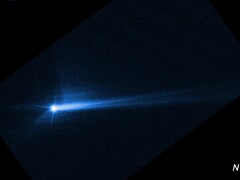 Immagine che mostra i detriti esplosi dalla superficie di Dimorpho dopo un impatto intenzionale da parte della sonda DART della NASA (Fonte immagine: NASA, ESA, STScI e Hubble; ritagliata)