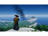 Una foto del paesaggio di Ghost of Tsushima che mostra Jin in piedi su una montagna che domina l'isola. (Fonte immagine: Steam)