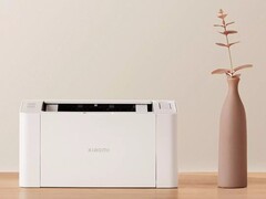 La stampante laser Xiaomi K100 ha dimensioni simili a quelle di un foglio A4. (Fonte: Xiaomi)