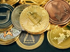 Una pila di criptovalute (Fonte: Traxer/Unsplash)
