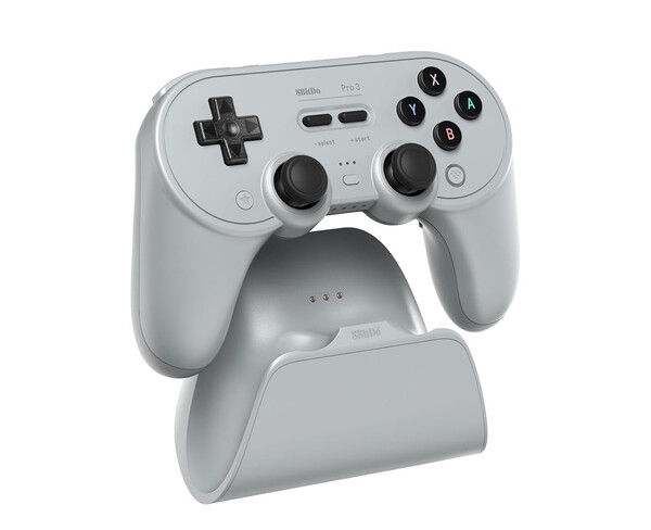 L'8BitDo Pro 3 viene fornito con un dock di ricarica che ospita l'adattatore da 2,4GHz. (Fonte immagine: 8BitDo)
