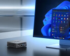 Il NUC150 può essere equipaggiato con l'Intel N150 o il Core 3 N355. Nella foto: un'immagine promozionale del mini PC seduto accanto a un monitor. (Fonte: Minix)