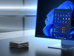 Il NUC150 può essere equipaggiato con l'Intel N150 o il Core 3 N355. Nella foto: un'immagine promozionale del mini PC seduto accanto a un monitor. (Fonte: Minix)