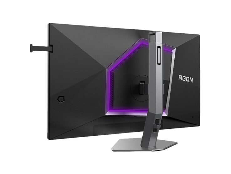 L'immagine mostra il retro del monitor da gioco AOC Agon Pro AG276UZ, caratterizzato da un design piuttosto accattivante per il gaming con illuminazione RGB viola.