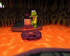 La schermata di Croc Legend of the Gobbos mostra Croc che salta sulla lava