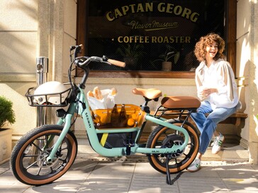 La e-bike a trazione diretta Segway Muxi è dotata di cestini anteriori e centrali e di posti a sedere per il passeggero posteriore. (Fonte: Segway)