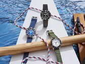 Tre orologi Citizen Promaster Dive con quadranti bianchi, neri e blu, ciascuno dotato di una lunetta da immersione abbinata e di un cinturino in uretano.