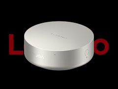 Il mini PC Lenovo Yoga Mini i, raffigurato su uno sfondo nero con il logo Lenovo in alto. (Fonte: Lenovo - modifica)