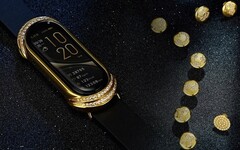 L&#039;indossabile Xiaomi Mi Band subisce un restyling in oro e diamanti nella &quot;Gold Collection&quot;. (Fonte: Xiaomi - modifica)