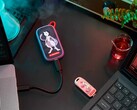 L’SSD portatile SANDISK Mewtwo e la chiavetta USB C Mew, realizzati in occasione del 30° anniversario di Pokémon, raffigurati nell’immagine