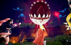 Una schermata di Palworld mostra i personaggi che combattono contro un bulbo oculare fluttuante con denti affilati