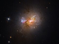 Un'immagine che mostra la galassia nana a esplosione stellare Henize 2-10.