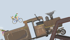 Gameplay di Happy Wheels che mostra un padre e un bambino in sella a una bicicletta mentre si dirigono verso una grande locomotiva su un percorso a ostacoli creato dall’utente.