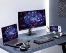 Monitor da gioco Asus XG27UCMG insieme a vari dispositivi elettronici Asus