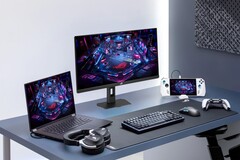 Monitor da gioco Asus XG27UCMG insieme a vari dispositivi elettronici Asus