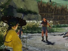 Atsu di Ghost of Yotei con una pistola in un campo nemico. (Fonte immagine: PlayStation su YouTube, screenshot)