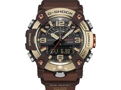 Primo piano del G-Shock Mudmaster GG-B100XMH-5A che mette in risalto la cassa e la lunetta nei toni del giallo oro chiaro e del marrone.