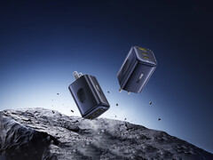 Il nuovo PicoGo 67 W AE11 costa 39,99 dollari. Nella foto: Un'immagine promozionale del caricabatterie rapido che fluttua nell'aria sopra delle rocce. (Fonte: Baseus)