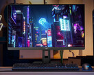 Il rinnovato ROG Strix XG27UCS può passare dalle modalità 4K 160Hz e FHD 324Hz. Nella foto: un'immagine promozionale che mostra una configurazione con il monitor da gioco. (Fonte: Asus)