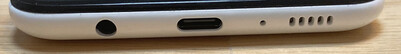 Lato inferiore: jack cuffie 3.5 mm, porta USB Type-C, microfono, cuffie