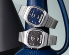 Gli orologi retrò analogico-digitali Casio AQ-240E-1A e AQ-240E-2A2, con quadranti sunburst rispettivamente neri e blu, sono raffigurati affiancati.