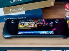 Un dispositivo Steam Deck seduto su un tavolo (Fonte immagine: Georgiy Lyamin via Unsplash)