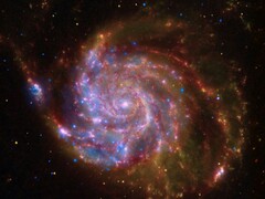 Un'immagine che mostra una galassia a spirale.