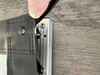 Tensione della tela mediante 40 bottoni a scatto