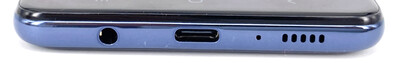 Lato inferiore: porta audio da 3.5 mm, porta USB-C, altoparlanti