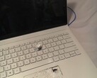 Twitter user Aaron's Surface Book after taking a bullet (Image source: @itsExtreme_)