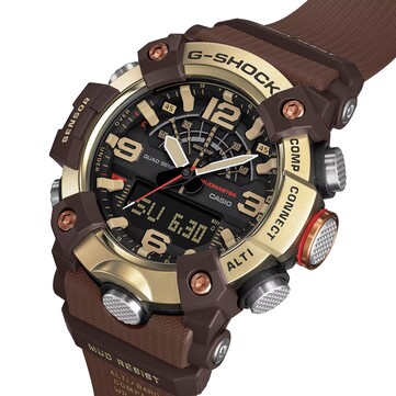 Vista obliqua del G-Shock Mudmaster GG-B100XMH-5A che ne mette in risalto il display digitale-analogico e la combinazione di colori giallo chiaro e marrone.