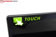 Un adesivo avvisa l'utente sul fatto che si trova davanti a un touchscreen.