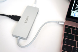 Always necessary but not included - adapter for the single USB Type C port