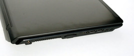 Lato destro: porta USB 2.0, unità ottica DVD, porta LAN, interfaccia VGA, Kensington lock