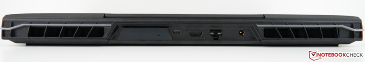 Retro: Slot per XMG OASIS (con coperchio), USB-C 3.2 Gen 2×1 (DisplayPort 1.4a), HDMI 2.1 (compatibile con G-SYNC, HDCP 2.3), porta RJ45 2,5 Gb/s (LAN), adattatore AC