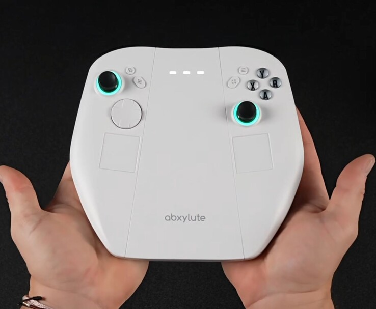 Modulo controller staccabile Abxylute 3D One, con doppio thumbstick con anelli LED, un D-pad, pulsanti facciali e trackpad integrati. (Fonte immagine: ETA PRIME via YouTube)