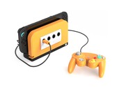 Il Retro Fighters BattleDock con un frontalino arancione speziato. (Fonte: Retro Fighters/Kickstarter)