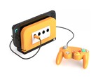 Il Retro Fighters BattleDock con un frontalino arancione speziato. (Fonte: Retro Fighters/Kickstarter)