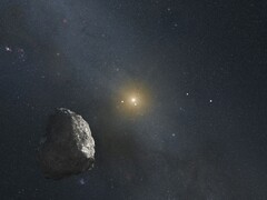 Un'illustrazione che raffigura un asteroide e una stella.