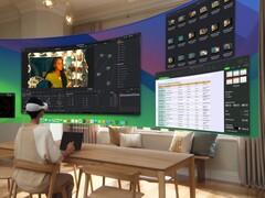 Un utente gestisce un desktop virtuale utilizzando le cuffie Apple Vision Pro (Fonte immagine: Apple)