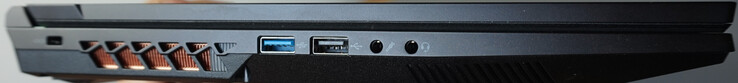 Sinistra: blocco Kensington, USB-A (5 Gbit/s), USB-A (0,5 Gbit/s), microfono, cuffie